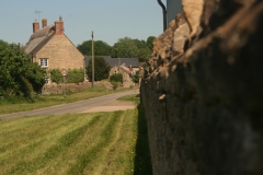 Yew Tree Farmhouse with blurred wall